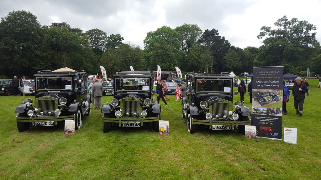 Three Vintage Hearse Cars
